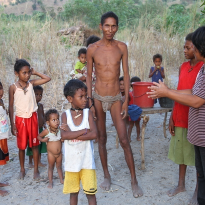 Aeta adults and children with missionary Divina (1)